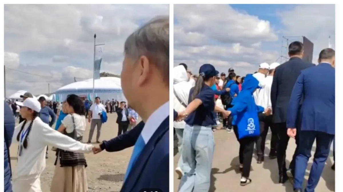 Абайдың тойында жастар шенеуніктерді шеңбер жасап қоршап жүрген