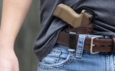 Подростка в Астане заставили отдать миллионы под дулом пистолета